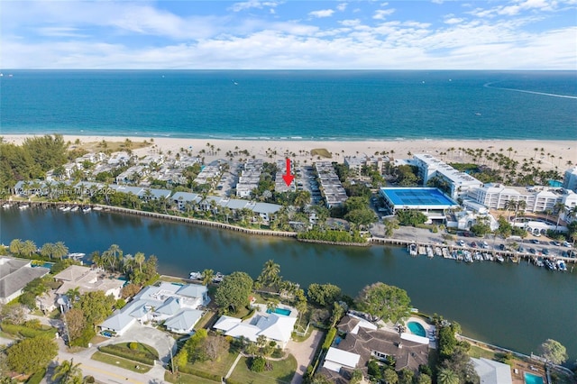 aerial view with a beach view and a water view