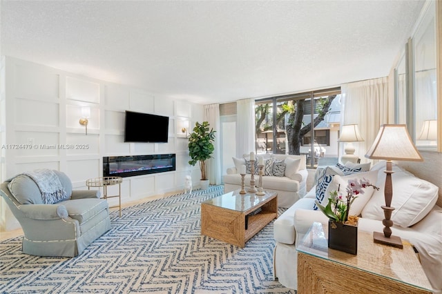 living room featuring a textured ceiling