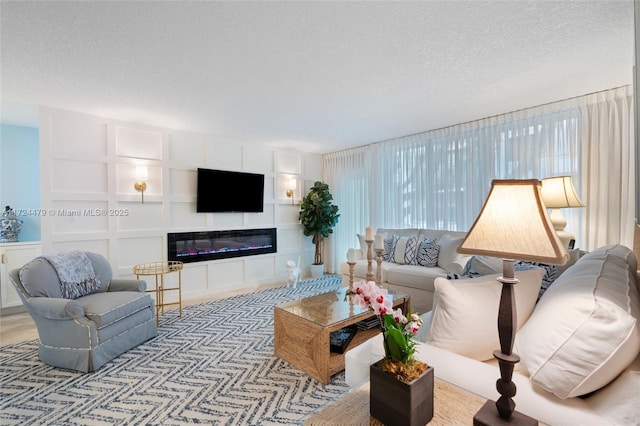 living room with a textured ceiling