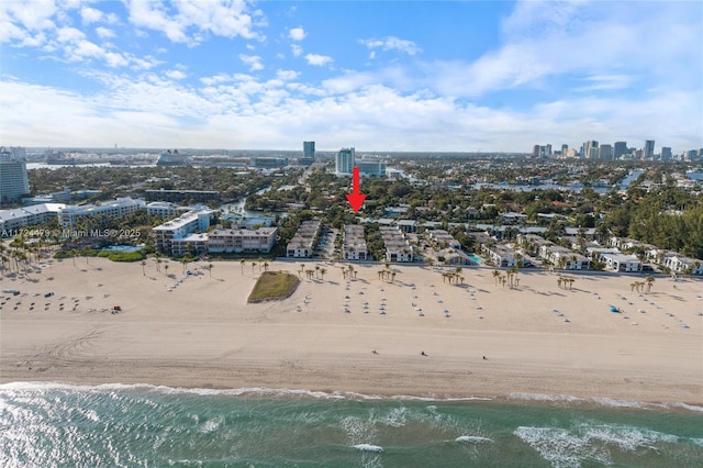 bird's eye view with a view of the beach and a water view