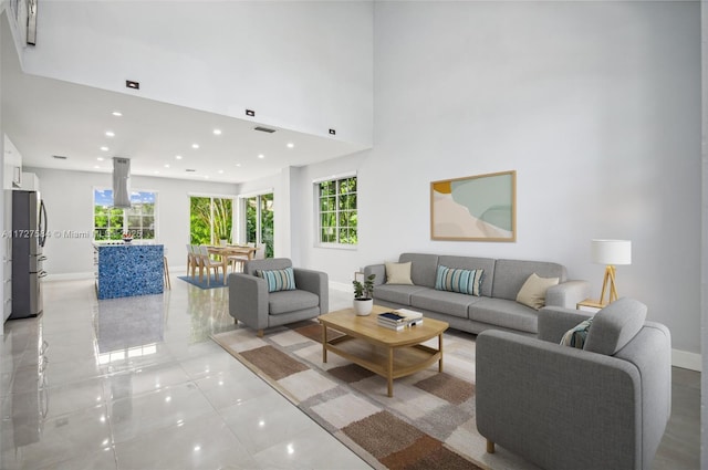 living room with light tile patterned floors