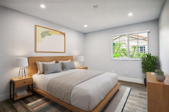 bedroom featuring wood-type flooring