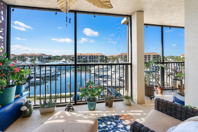 balcony featuring a water view