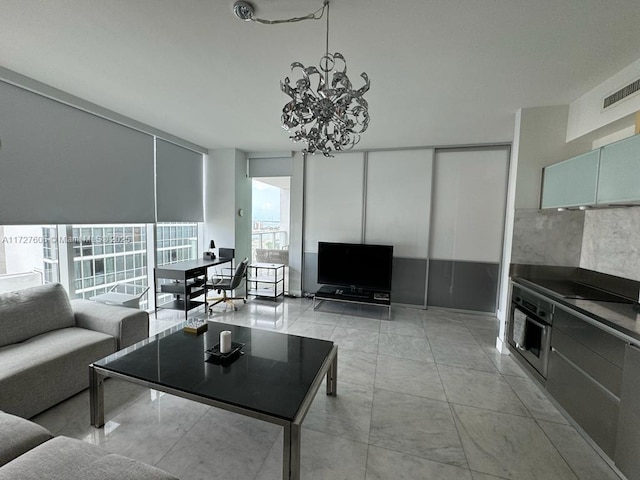 living room with a chandelier