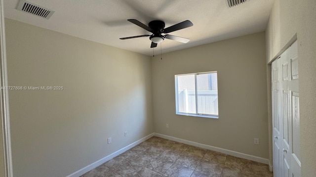 empty room with ceiling fan