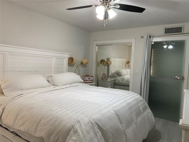 bedroom featuring a closet and ceiling fan