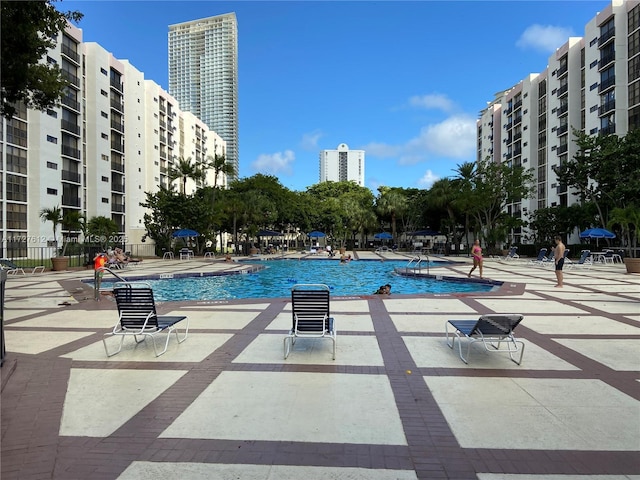 view of swimming pool with a patio