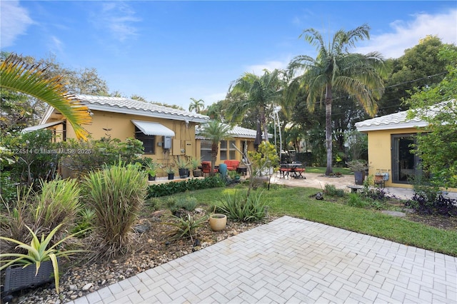 view of yard with a patio area