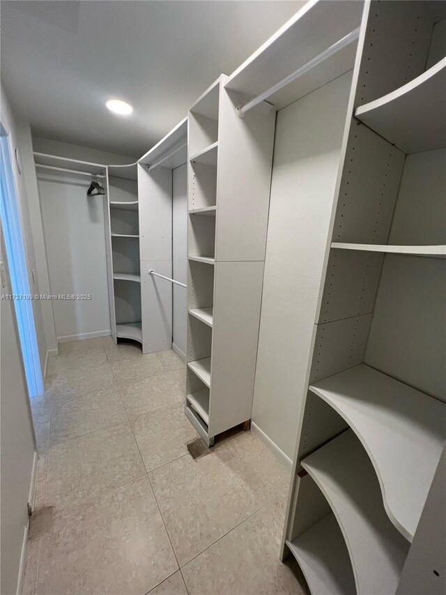 1998 Overseas Hwy Unit 33A, Marathon, FL 33050 - walk in closet with tile patterned floors