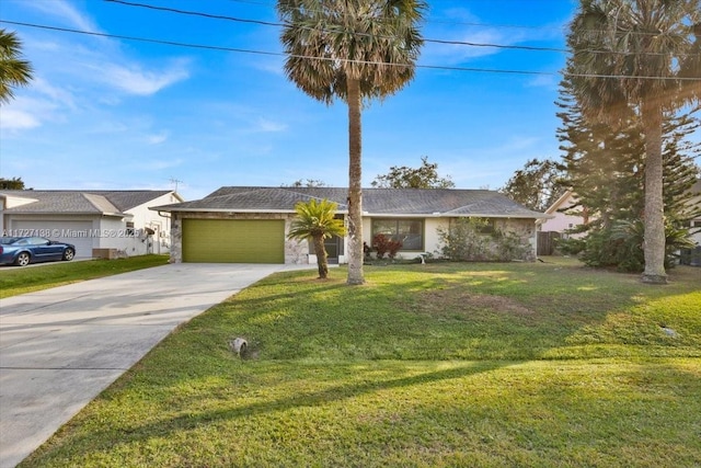 ranch-style house featuring a front lawn and a garage