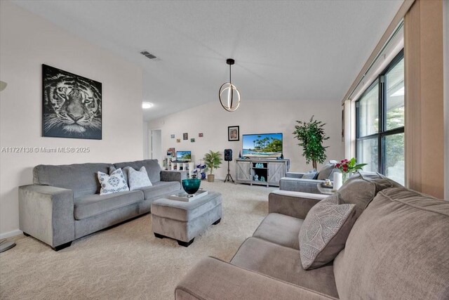 3270 Deer Lick, Kissimmee, FL 34746 - living room with vaulted ceiling and light colored carpet