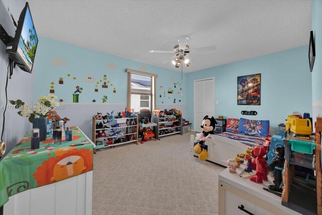3270 Deer Lick, Kissimmee, FL 34746 - carpeted bedroom with a textured ceiling, a closet, and ceiling fan
