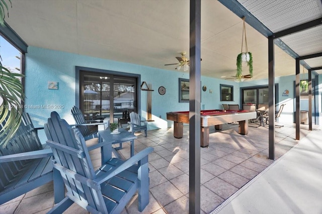 view of patio featuring ceiling fan