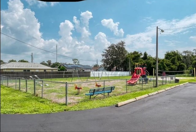 view of play area with a yard