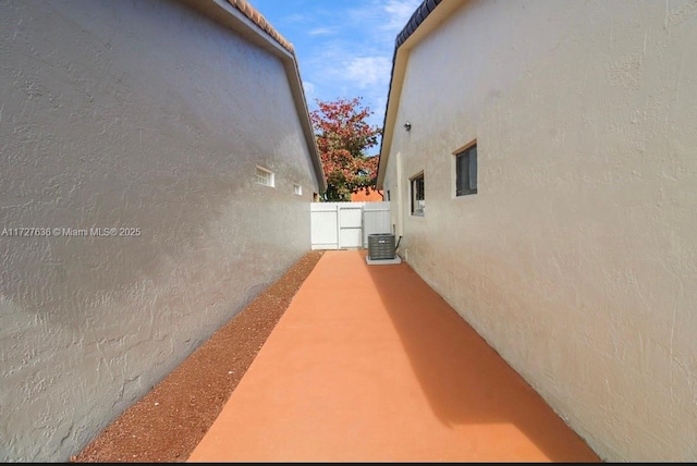 view of property exterior featuring central air condition unit