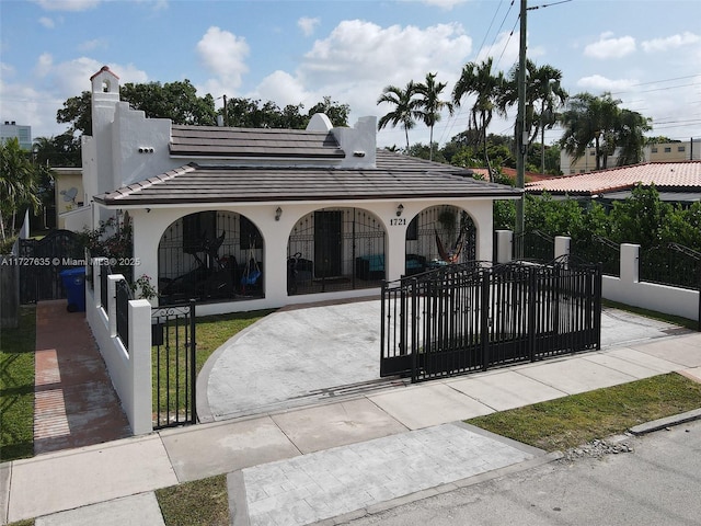 view of gate featuring a fenced front yard