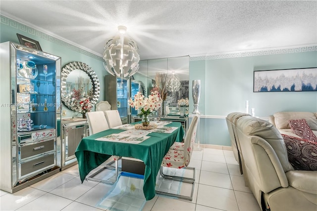 tiled dining area featuring crown molding and a textured ceiling