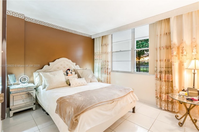 bedroom featuring light tile patterned floors