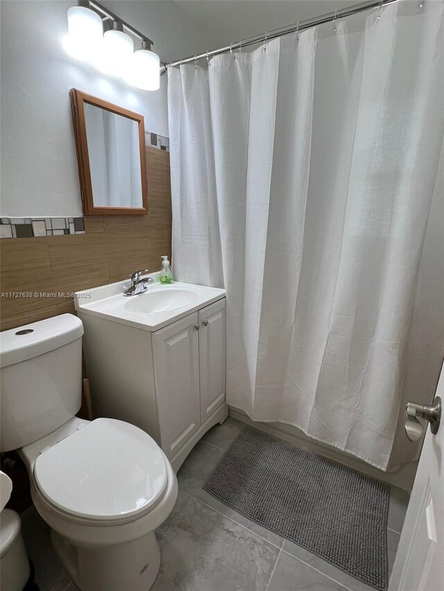 unfurnished bedroom with light tile patterned floors, a closet, and a textured ceiling