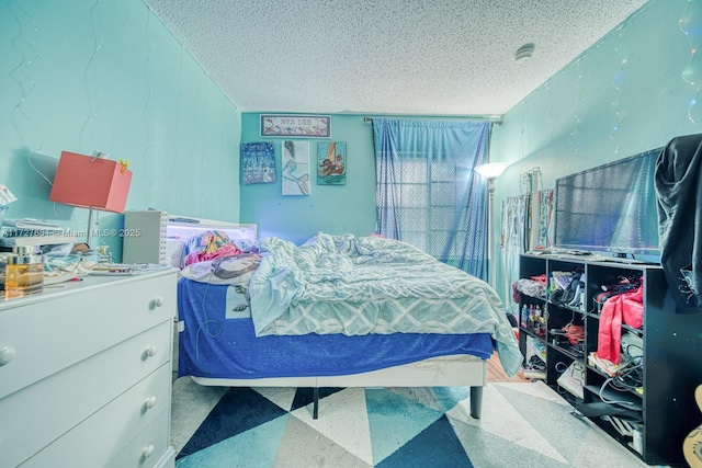 bedroom featuring a textured ceiling