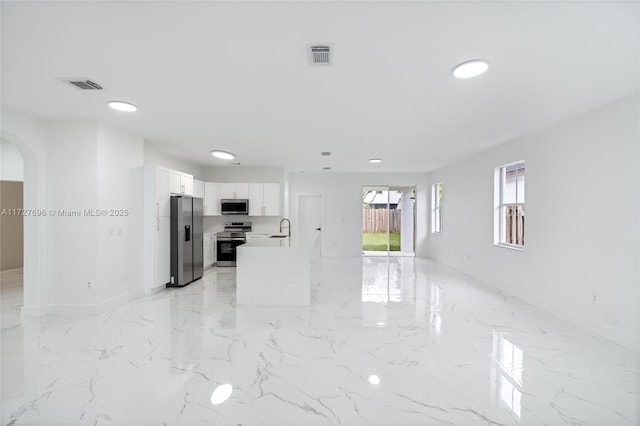 unfurnished room with sink