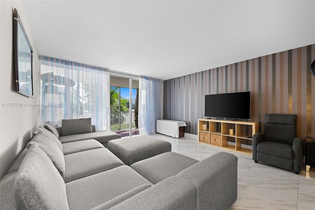 living room with floor to ceiling windows