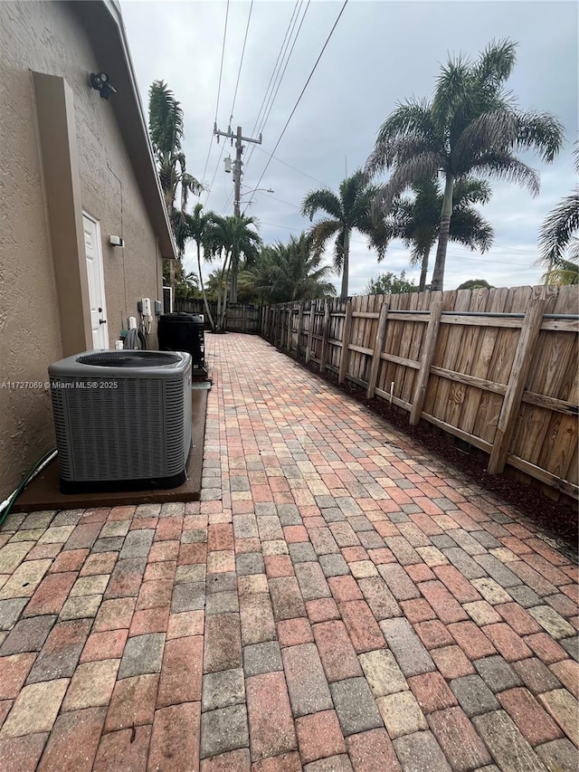 view of patio featuring central air condition unit