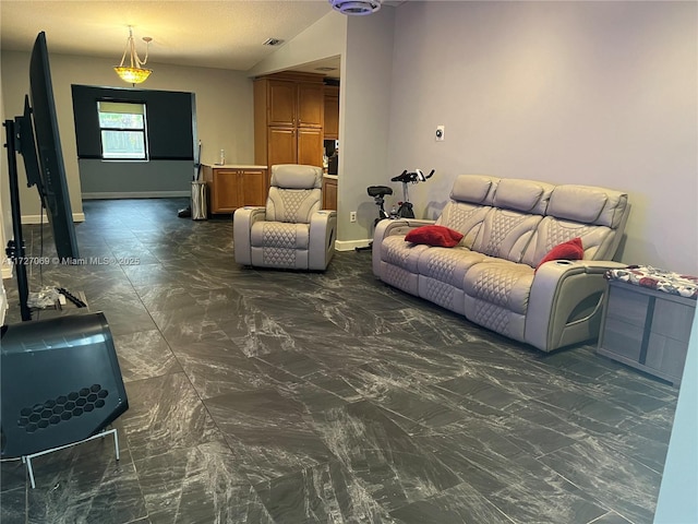 living room with vaulted ceiling