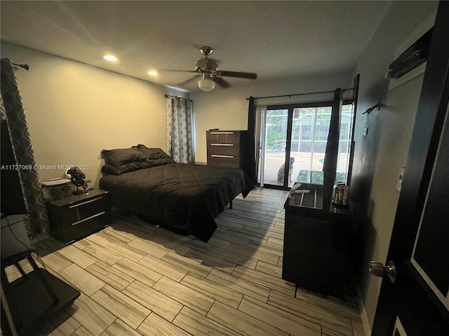 bedroom with access to exterior and ceiling fan