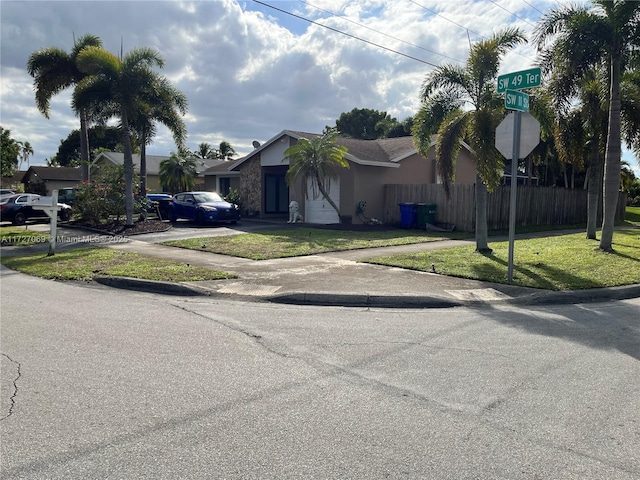 view of front of home with a front lawn