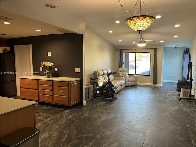 living room with ceiling fan