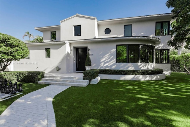 view of front of home with a front yard