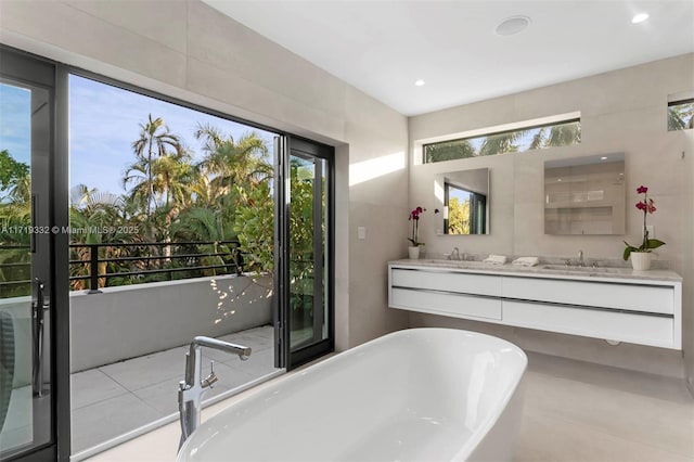 bathroom featuring a bathtub and vanity