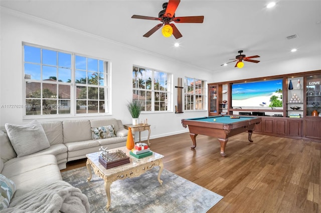 playroom with ceiling fan, ornamental molding, pool table, and hardwood / wood-style flooring