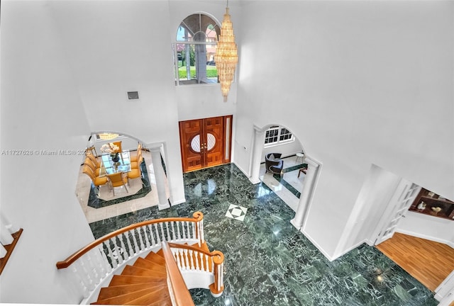 foyer featuring a high ceiling