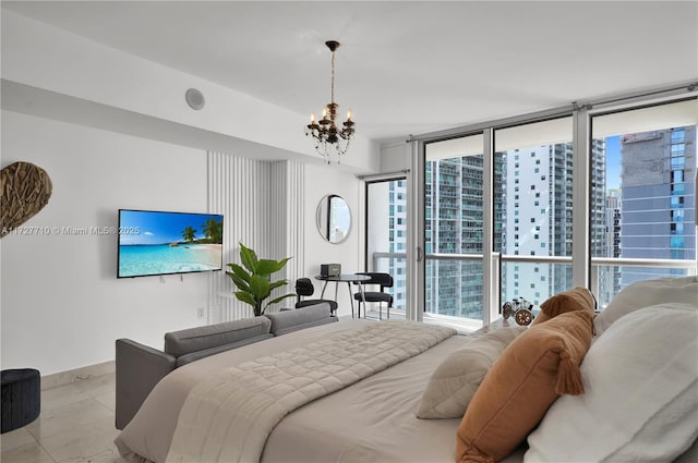 bedroom with a chandelier, a wall of windows, and multiple windows