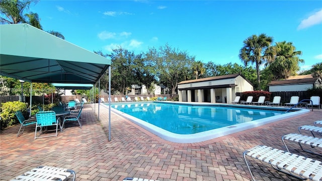 view of swimming pool with a patio