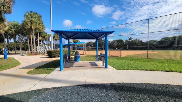 view of jungle gym featuring a lawn