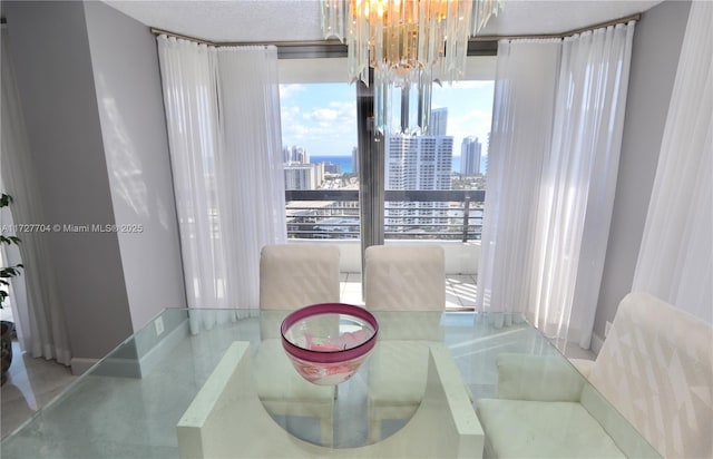 dining space featuring a chandelier