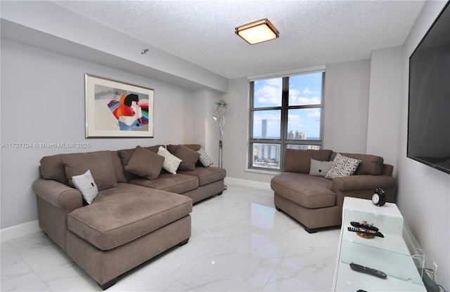 living room with a textured ceiling