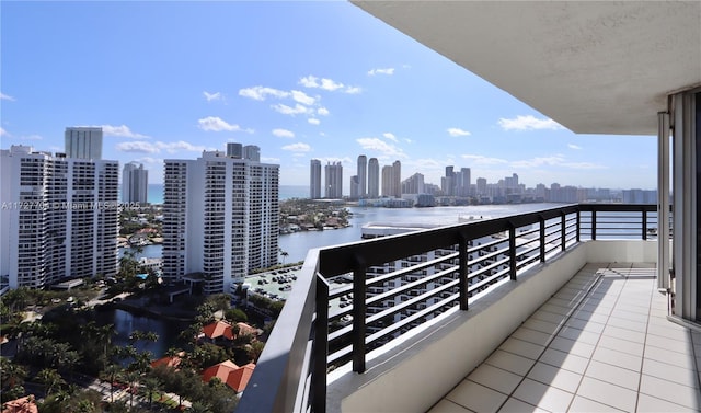 balcony featuring a water view