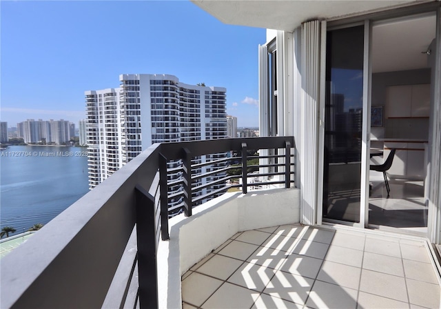 balcony featuring a water view