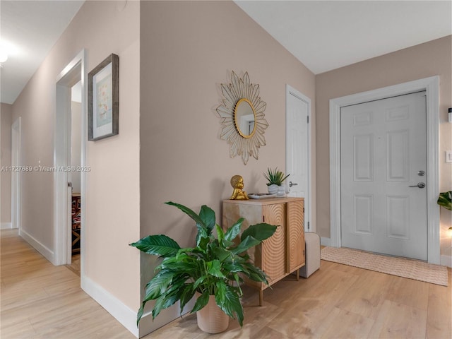 foyer with light hardwood / wood-style flooring