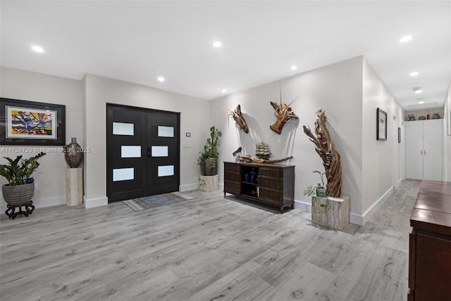 foyer featuring light wood-type flooring