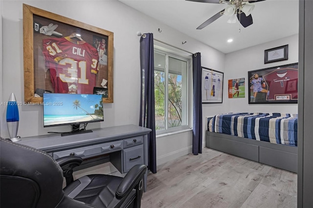 bedroom featuring ceiling fan and light hardwood / wood-style floors