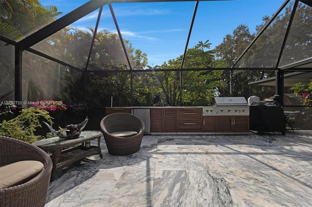 view of patio / terrace with grilling area, glass enclosure, and an outdoor kitchen