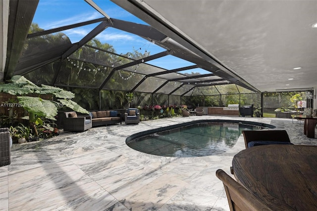 view of swimming pool featuring a patio, outdoor lounge area, glass enclosure, and a jacuzzi