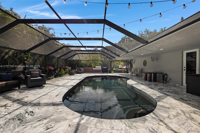 view of swimming pool featuring an outdoor living space, a lanai, and a patio