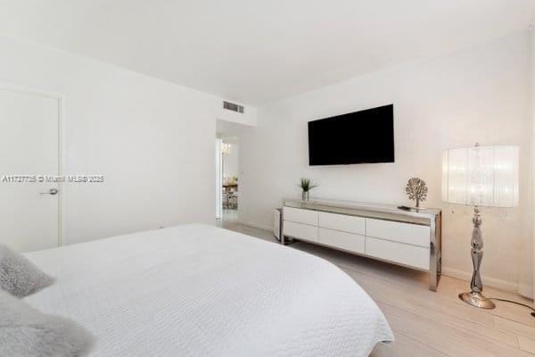 bedroom featuring light hardwood / wood-style flooring