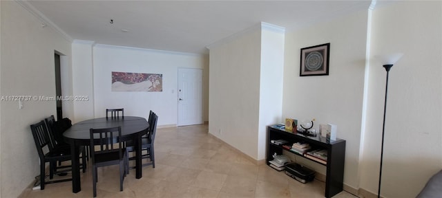 dining area featuring crown molding